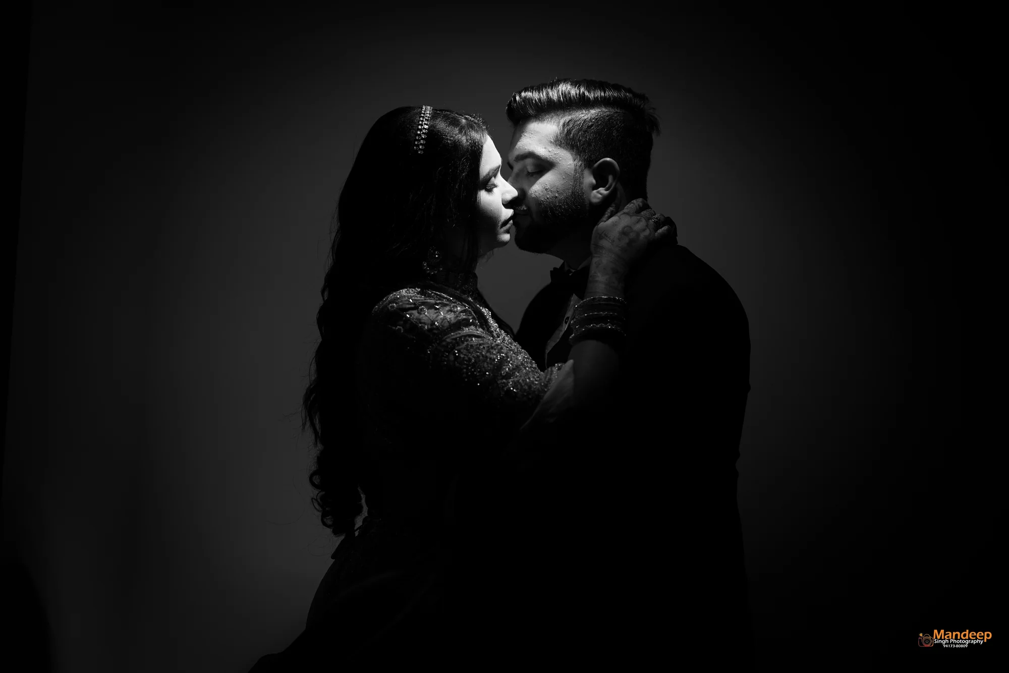 A dramatic black and white portrait of Tanya and Vyom