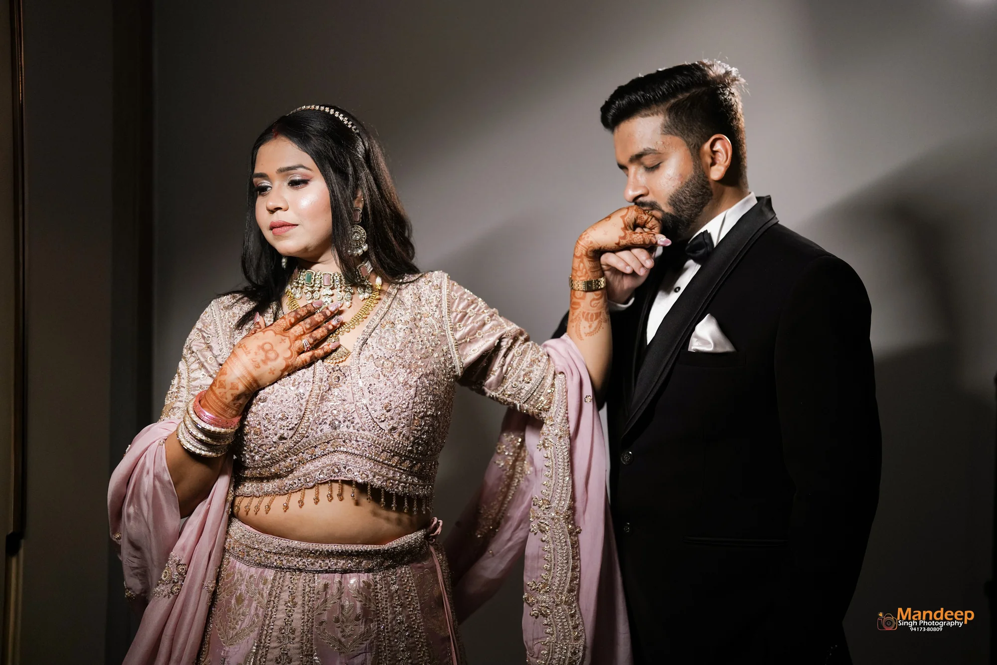 Vyom holding Tanya’s hand